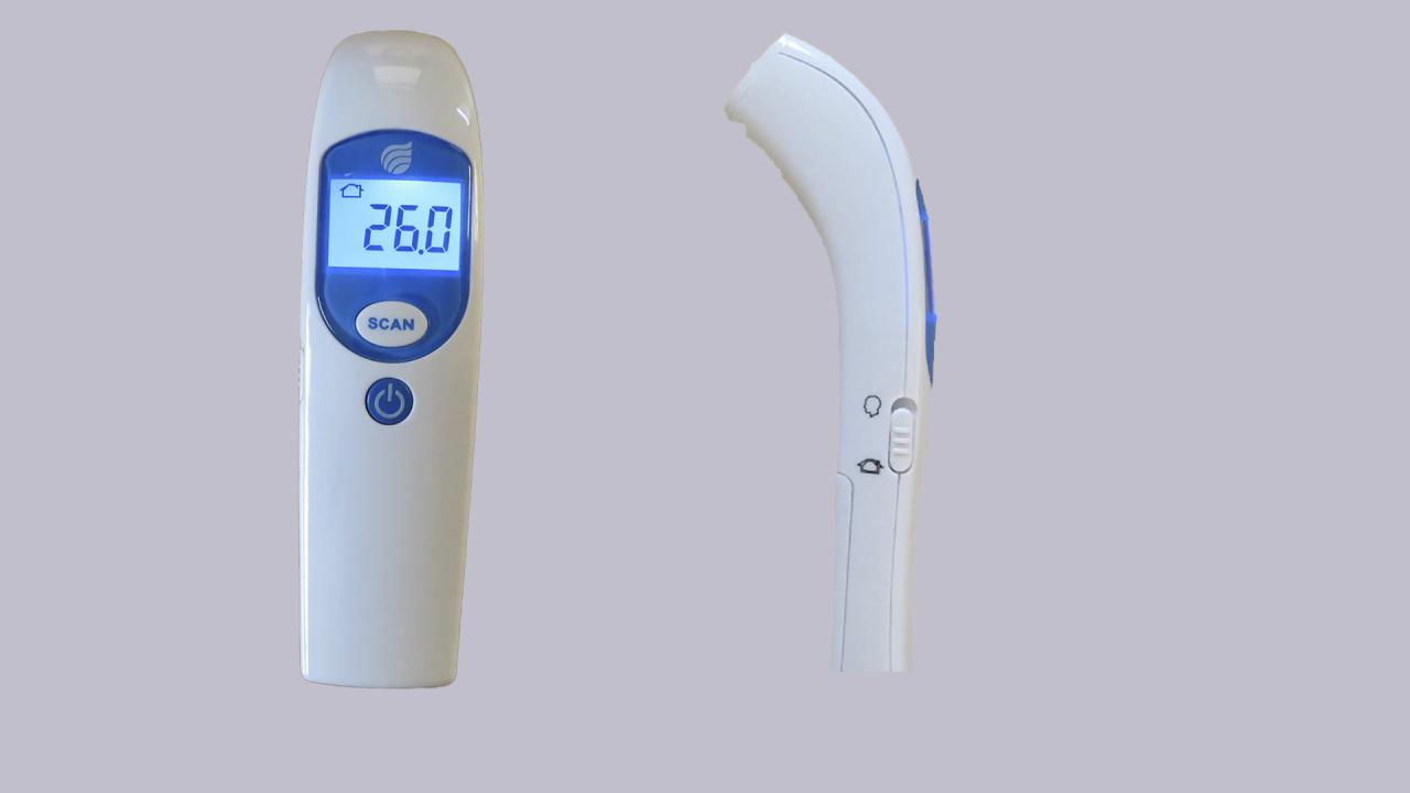 Puhuva lämpömittari. Näytössä 26 astetta, sivukuvassa säätönappi henkilön tai sisälämpötilan mittaus